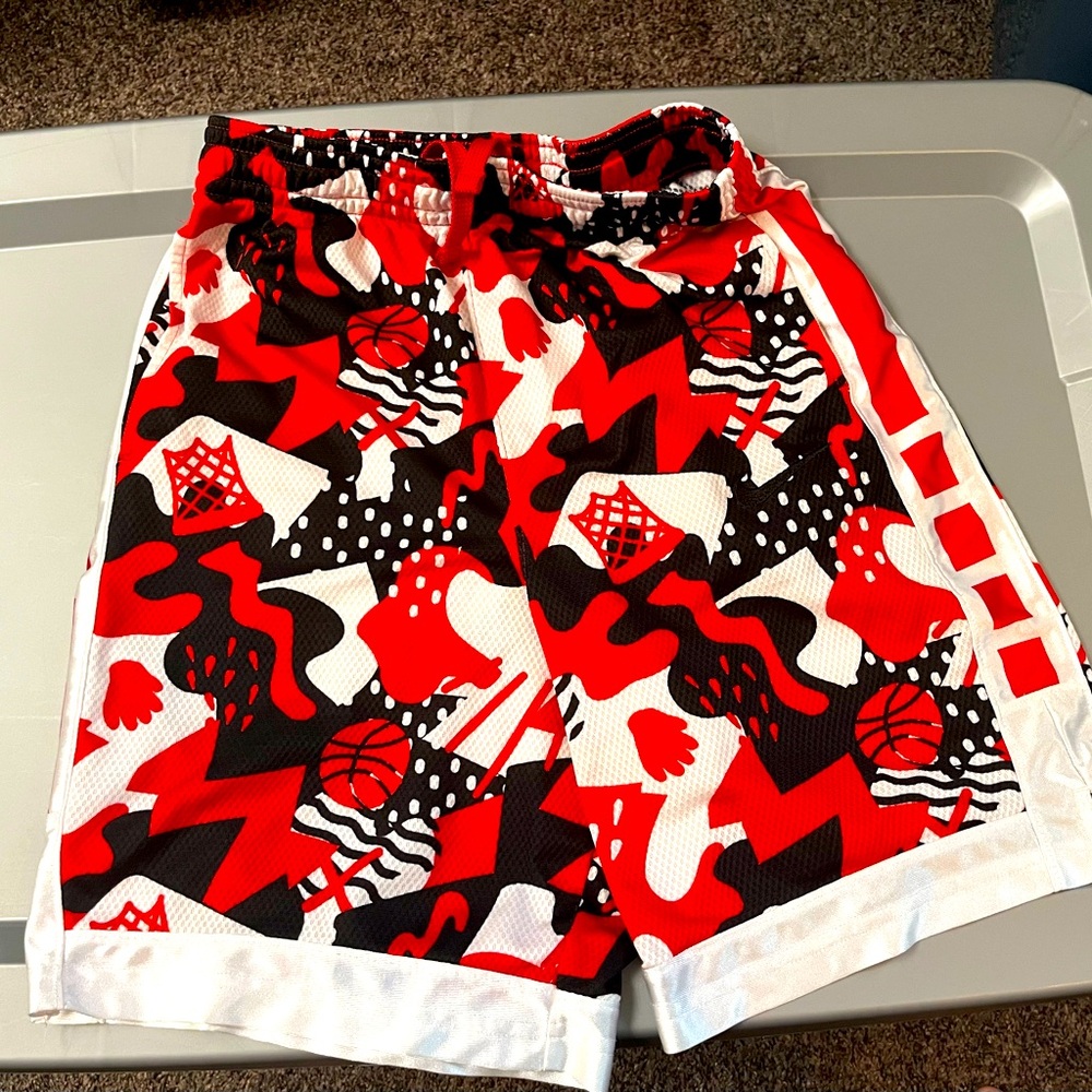 Boys Nike size Xl red, white and black basketball design dri-fit shorts.